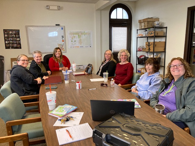 Members of the Quay County Health Council HEAL Committee sitting around a table