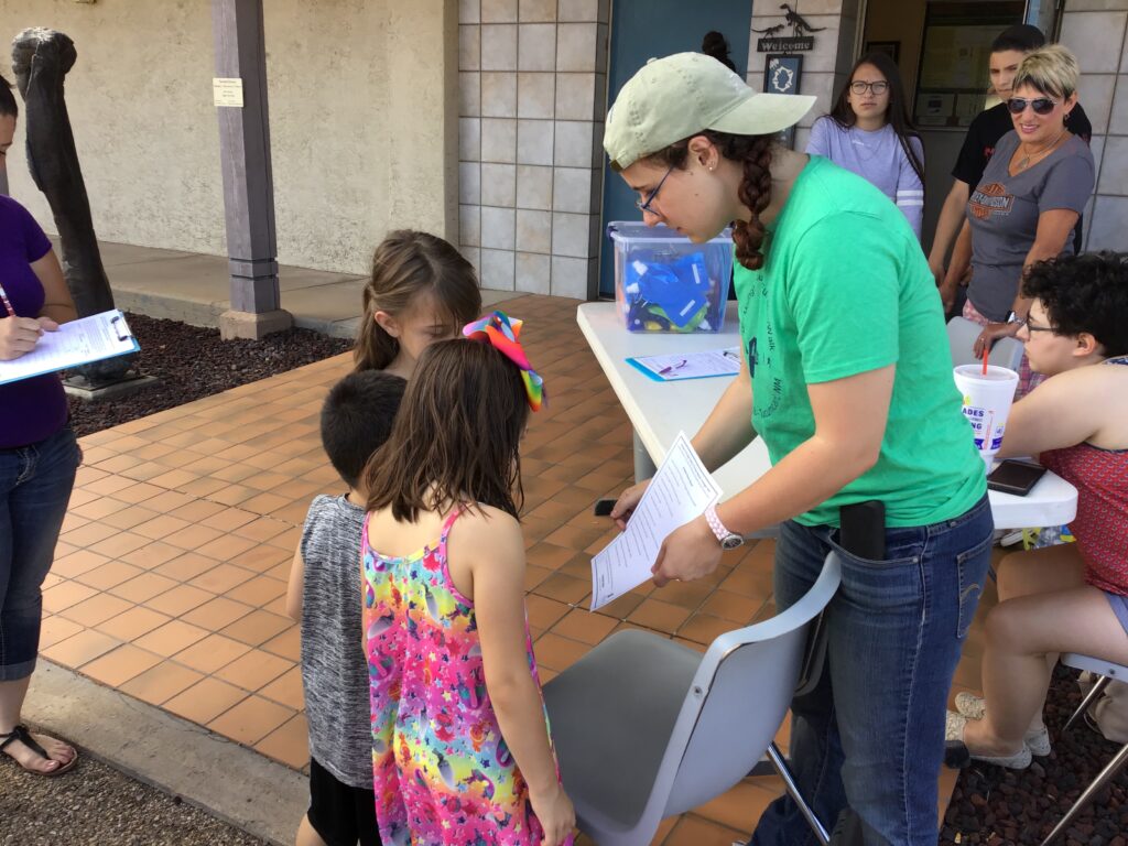 group of people registering for an event